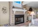 Close-up of a cozy fireplace with a brick hearth and decorative mantle at 341 Seabrook Island Rd, Seabrook Island, SC 29455