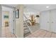 Inviting hallway leads to a dining area with a chandelier and features tile flooring at 341 Seabrook Island Rd, Seabrook Island, SC 29455