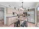 Well-equipped kitchen with granite countertops, stainless steel appliances, and a breakfast bar at 341 Seabrook Island Rd, Seabrook Island, SC 29455