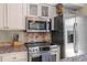 Updated kitchen featuring stainless steel appliances and granite countertops at 341 Seabrook Island Rd, Seabrook Island, SC 29455