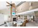 Spacious living room with a fireplace, high ceilings, and seamless transition to the dining area at 341 Seabrook Island Rd, Seabrook Island, SC 29455