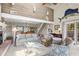 Bright living room featuring high ceilings, wood accents, and comfortable seating arrangements at 341 Seabrook Island Rd, Seabrook Island, SC 29455
