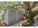Outdoor storage shed nestled under a large tree at 341 Seabrook Island Rd, Seabrook Island, SC 29455