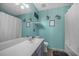 Bathroom with a double sink vanity, framed mirror, and shower-tub combo at 406 Brookfield Ln, Goose Creek, SC 29445