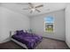 Bedroom featuring neutral carpet, a ceiling fan, and a window providing natural light at 406 Brookfield Ln, Goose Creek, SC 29445
