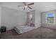Bedroom features a ceiling fan and a window with natural light at 406 Brookfield Ln, Goose Creek, SC 29445