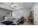 Relaxing bedroom with a queen-sized bed, soft lighting, and closet space at 406 Brookfield Ln, Goose Creek, SC 29445