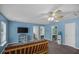 Open bonus room with blue walls, carpet and a TV at 406 Brookfield Ln, Goose Creek, SC 29445