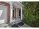 Inviting front porch with decorative accents and well-maintained landscaping at 406 Brookfield Ln, Goose Creek, SC 29445