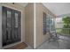Welcoming front porch with black door and seating for relaxation at 406 Brookfield Ln, Goose Creek, SC 29445