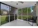 Relaxing screened porch features roll down shades and views of the backyard at 406 Brookfield Ln, Goose Creek, SC 29445