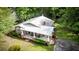 Aerial view of a brick home featuring a metal roof and well-maintained landscaping at 416 Altman St, Moncks Corner, SC 29461