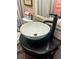 Close-up of a lovely bathroom sink with black fixtures and granite top at 416 Altman St, Moncks Corner, SC 29461