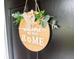 Close-up of a decorative wreath on a black door, adding a personalized touch to the home's entrance at 416 Altman St, Moncks Corner, SC 29461