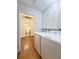 Functional laundry area with washer and dryer hookups, next to a bathroom with wood flooring at 416 Altman St, Moncks Corner, SC 29461