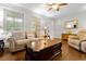 Cozy living room with hardwood floors, a comfortable sofa, and a welcoming ambiance at 416 Altman St, Moncks Corner, SC 29461