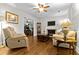 Inviting living room with hardwood floors, a fireplace, and comfortable seating at 416 Altman St, Moncks Corner, SC 29461