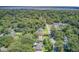Aerial view of homes and neighborhood, highlighted by mature trees, landscaping and nearby river at 422 Geddes Ave, Charleston, SC 29407