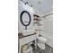Bright bathroom featuring a vessel sink, toilet, shower-tub combo with white subway tile, and black accents at 422 Geddes Ave, Charleston, SC 29407