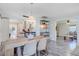 Open-concept dining area with views of the kitchen and living room, perfect for entertaining at 422 Geddes Ave, Charleston, SC 29407