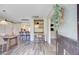 Bright entryway featuring a wooden table set, dining room, and decorative wreath at 422 Geddes Ave, Charleston, SC 29407