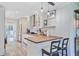 Bright, white kitchen featuring butcher block countertops, stainless appliances, and pendant lighting at 422 Geddes Ave, Charleston, SC 29407