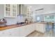 Beautiful white kitchen featuring wood countertops, stainless steel appliances, and modern lighting at 422 Geddes Ave, Charleston, SC 29407