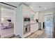 Bright kitchen with a microwave, stainless steel oven, and white cabinets at 422 Geddes Ave, Charleston, SC 29407