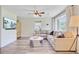 Bright living room featuring a comfortable sectional sofa, stylish decor, and lots of natural light at 422 Geddes Ave, Charleston, SC 29407