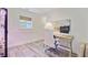 Cozy home office with a window, desk, comfortable chair, modern computer, and stylish decor at 422 Geddes Ave, Charleston, SC 29407