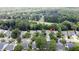 Aerial view of the property showcasing its location within a lush, green, residential community at 4969 Franconia Dr, Summerville, SC 29485