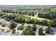 Aerial view of a single-Gathering home backing onto a lush green space offering privacy and scenic views at 4969 Franconia Dr, Summerville, SC 29485