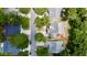 Aerial shot of a well-maintained home featuring a backyard patio and mature trees in a quiet neighborhood at 4969 Franconia Dr, Summerville, SC 29485