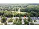 Aerial view of a residential property with manicured landscaping and mature trees in a peaceful neighborhood setting at 4969 Franconia Dr, Summerville, SC 29485