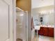 Ensuite bathroom with a glass enclosed shower, double sink vanity, and ample counter space at 4969 Franconia Dr, Summerville, SC 29485
