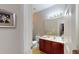 Cozy bathroom featuring a single sink vanity, toilet, and shower stall at 4969 Franconia Dr, Summerville, SC 29485
