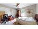 Bedroom featuring a ceiling fan, a window, and a bed at 4969 Franconia Dr, Summerville, SC 29485
