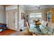 Formal dining room featuring natural lighting, classic furniture, and trim detail at 4969 Franconia Dr, Summerville, SC 29485