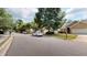 Charming home featuring a well-manicured front yard, attached garage, and inviting front porch at 4969 Franconia Dr, Summerville, SC 29485