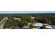 Picturesque aerial shot of the golf course enveloped by rich woodland, highlighting a tranquil escape at 4969 Franconia Dr, Summerville, SC 29485