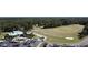 Expansive golf course featuring neatly cut fairways, sand traps, and serene wooded areas at 4969 Franconia Dr, Summerville, SC 29485