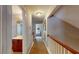 Upstairs hallway with bathroom and bedroom access, showcasing functional design and connectivity at 4969 Franconia Dr, Summerville, SC 29485