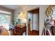 Cozy home hallway with a view of the living room, adorned with a decorative mirror at 4969 Franconia Dr, Summerville, SC 29485