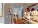 Inviting hallway with hardwood floors, elegant decor, and staircase leading to the upper level at 4969 Franconia Dr, Summerville, SC 29485