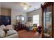 Comfortable living room with a ceiling fan, cozy seating, and decorative accents at 4969 Franconia Dr, Summerville, SC 29485