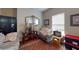 Living room showcasing traditional décor, natural light, and comfortable seating at 4969 Franconia Dr, Summerville, SC 29485