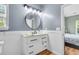 Bathroom with modern vanity, fixtures, mirror and view into bedroom at 519 Tarleton Dr, Summerville, SC 29483