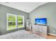 Bedroom features hardwood floors, closet, and a view into bathroom and the exterior at 519 Tarleton Dr, Summerville, SC 29483