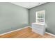 Bedroom featuring hardwood floors and a window with a view of the exterior at 519 Tarleton Dr, Summerville, SC 29483