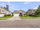A well-kept home nestled among other residences, showcasing its curb appeal and neighborhood setting at 519 Tarleton Dr, Summerville, SC 29483